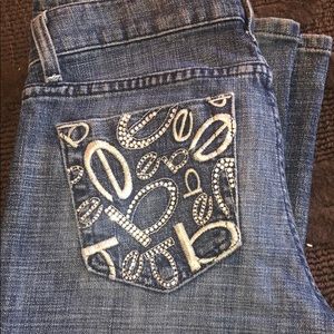 Bebe jeans plain with detailing on the butt